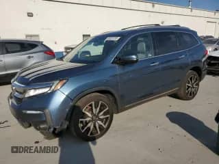 2019 Honda Pilot Touring 7-Passenger z VIN 5FNYF6H66KB094855, wystawiony jako Copart lot #69297265 z przebiegiem 73 955 mil mil oraz Szkoda całkowita • Salvage title. Historia ofert i sprzedaży dostępna na DreamBid. Obrazek 1.
