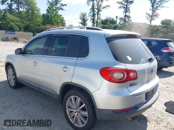2011 Volkswagen Tiguan S with VIN WVGAV7AX0BW550630, listed as a IAAI auction lot 42445650 with 185,176 mi miles and . Bid and sale history available at DreamBid. Image 14.