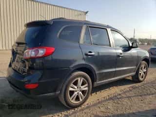 2010 Hyundai Santa Fe Limited с VIN 5NMSKDAG6AH359683, выставлен на аукционе Copart как лот 66179444 с пробегом 234 803 миль миль и Списание • Salvage title. История ставок и продаж доступна на DreamBid. Изображение 3.