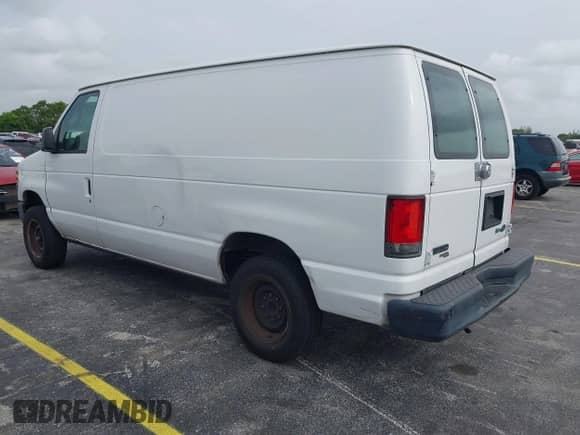 2013 Ford Econoline Cargo Commercial with VIN 1FTNE1EW1DDA90039, listed as a IAAI auction lot 42439049 with 218,937 mi miles and . Bid and sale history available at DreamBid. Image 3.