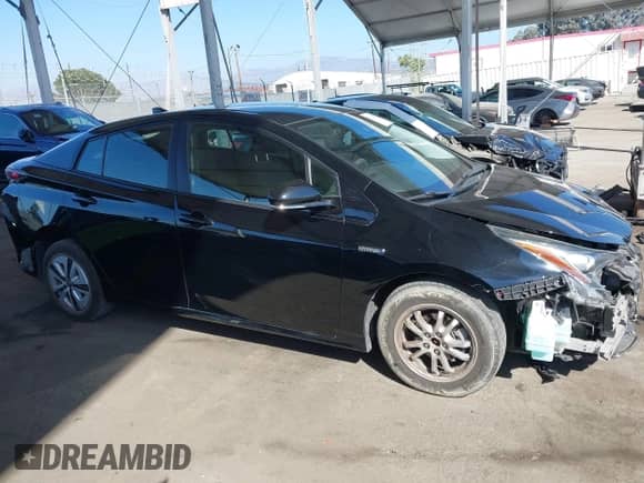 2018 Toyota Prius Two z VIN JTDKBRFU7J3072573, wystawiony jako IAAI lot #43402083 z przebiegiem 73 758 mil mil oraz . Historia ofert i sprzedaży dostępna na DreamBid. Obrazek 14.