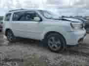 2014 Honda Pilot EX-L with VIN 5FNYF3H5XEB013849, listed as a Copart auction lot 69325505 with 111,728 mi miles and Non repairable. Bid and sale history available at DreamBid. Image 4.