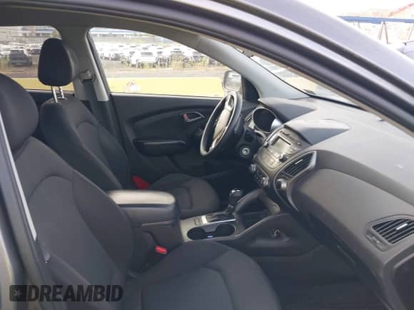 2014 Hyundai Tucson GLS with VIN KM8JTCAFXEU950569, listed as a IAAI auction lot 43243357 with 146,413 mi miles and . Bid and sale history available at DreamBid. Image 5.