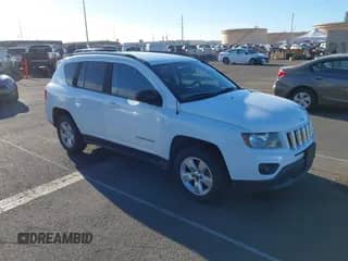 2014 Jeep Compass Sport z VIN 1C4NJCBA4ED881778, wystawiony jako IAAI lot #43359604 z przebiegiem 92 729 mil mil oraz . Historia ofert i sprzedaży dostępna na DreamBid. Obrazek 1.