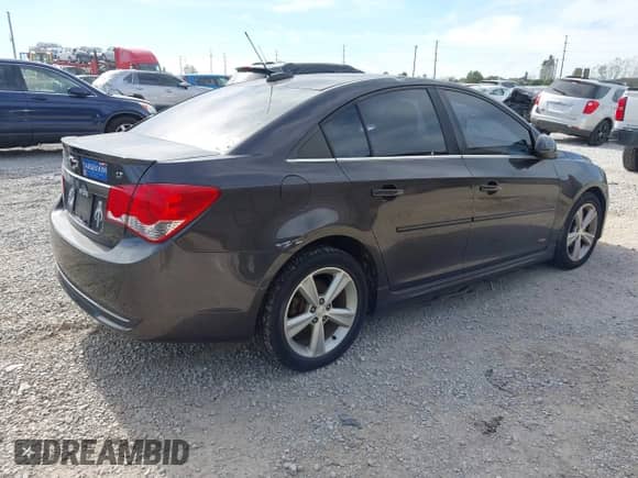2015 Chevrolet Cruze LT with VIN 1G1PE5SB8F7198220, listed as a IAAI auction lot 43491471 with 133,321 mi miles and . Bid and sale history available at DreamBid. Image 4.