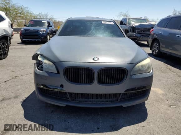 2012 BMW 7 Series 750i with VIN WBAKA8C52CDS99934, listed as a Copart auction lot 69425225 with 93,075 mi miles and Salvage title. Bid and sale history available at DreamBid. Image 5.
