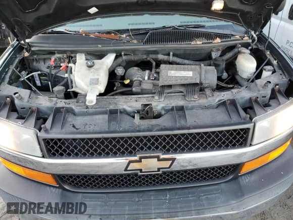 2008 Chevrolet Express Cargo with VIN 1GBHG39K881195229, listed as a Copart auction lot 84997374 with 69,500 mi miles and Salvage title. Bid and sale history available at DreamBid. Image 7.