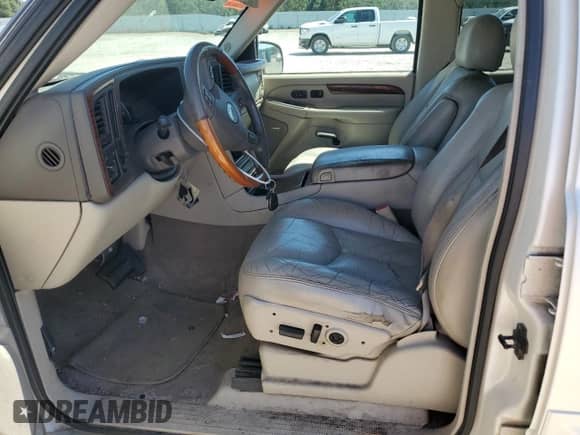 2004 Cadillac Escalade with VIN 1GYEC63T94R142929, listed as a Copart auction lot 58657835 with 147,193 mi miles and Clean title. Bid and sale history available at DreamBid. Image 7.