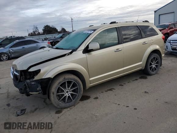 2011 Dodge Journey LUX with VIN 3D4PH9FG9BT522991, listed as a Copart auction lot 87270714 with 101,661 mi miles and Salvage title. Bid and sale history available at DreamBid. Image 1.