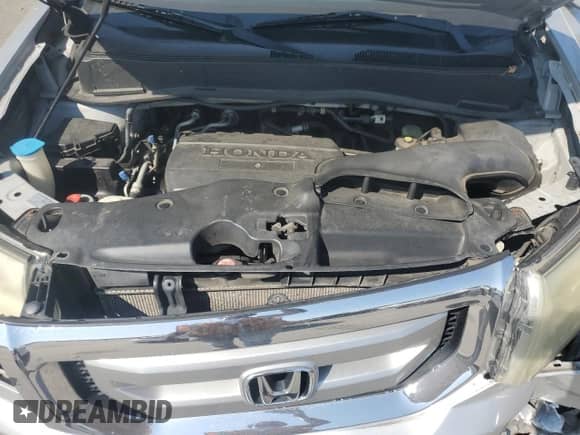 2009 Honda Pilot Touring with VIN 5FNYF48829B024561, listed as a Copart auction lot 66168365 with 150,536 mi miles and Salvage title. Bid and sale history available at DreamBid. Image 12.