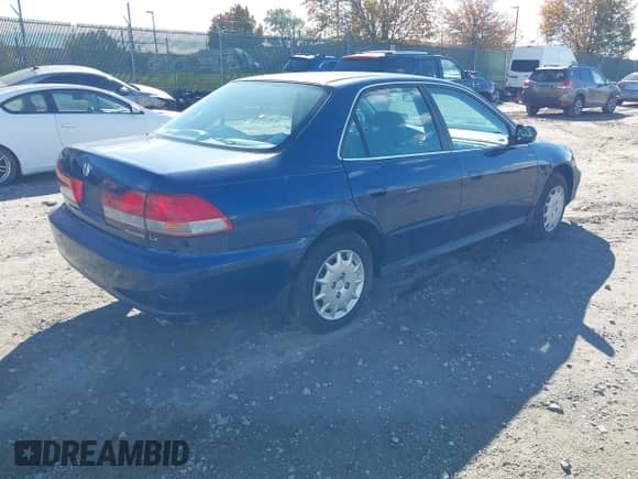 2002 Honda Accord LX with VIN 1HGCG66562A162048, listed as a IAAI auction lot 43514272 with 98,699 mi miles and . Bid and sale history available at DreamBid. Image 4.