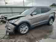 2018 Hyundai Santa Fe 2.0T with VIN 5XYZUDLA5JG549440, listed as a Copart auction lot 70559825 with 128,417 mi miles and Salvage title. Bid and sale history available at DreamBid. Image 1.
