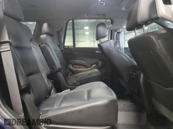 2018 Chevrolet Tahoe Premier with VIN 1GNSKCKC1JR186910, listed as a Copart auction lot 68302015 with 99,990 mi miles and Salvage title. Bid and sale history available at DreamBid. Image 11.