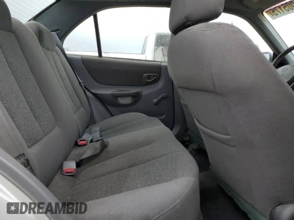 2000 Hyundai Accent with VIN KMHCG45G8YU120795, listed as a Copart auction lot 61005175 with 96,515 mi miles and Clean title. Bid and sale history available at DreamBid. Image 10.