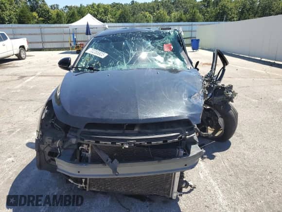 2016 Chevrolet Cruze LT z VIN 1G1PE5SBXG7166936, wystawiony jako Copart lot #70285805 z przebiegiem Nie podano mil oraz Szkoda całkowita • Salvage title. Historia ofert i sprzedaży dostępna na DreamBid. Obrazek 5.