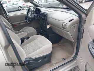 2003 Chevrolet Venture Y3G Mobility z VIN 1GNDX03E23D142567, wystawiony jako IAAI lot #42601079 z przebiegiem 215 618 mil mil oraz . Historia ofert i sprzedaży dostępna na DreamBid. Obrazek 5.