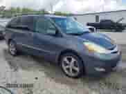 2006 Toyota Sienna XLE z VIN 5TDZA22C86S564606, wystawiony jako Copart lot #63309105 z przebiegiem 186 965 mil mil oraz Szkoda całkowita • Salvage title. Historia ofert i sprzedaży dostępna na DreamBid. Obrazek 4.