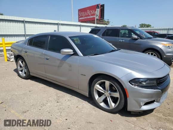 2016 Dodge Charger R/T with VIN 2C3CDXCT8GH346730, listed as a Copart auction lot 65763195 with 103,253 mi miles and Salvage title. Bid and sale history available at DreamBid. Image 4.