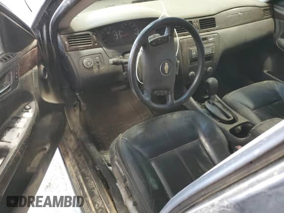 2012 Chevrolet Impala LTZ with VIN 2G1WC5E32C1104718, listed as a Copart auction lot 41334555 with Not provided miles and Salvage title. Bid and sale history available at DreamBid. Image 8.