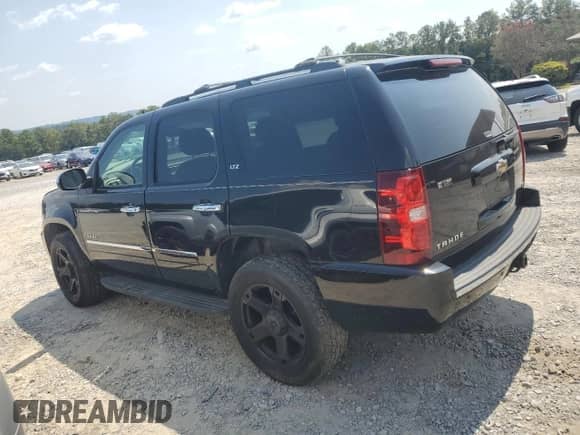 2009 Chevrolet Tahoe LTZ with VIN 1GNFK33039R297816, listed as a Copart auction lot 72091945 with 212,058 mi miles and Salvage title. Bid and sale history available at DreamBid. Image 2.