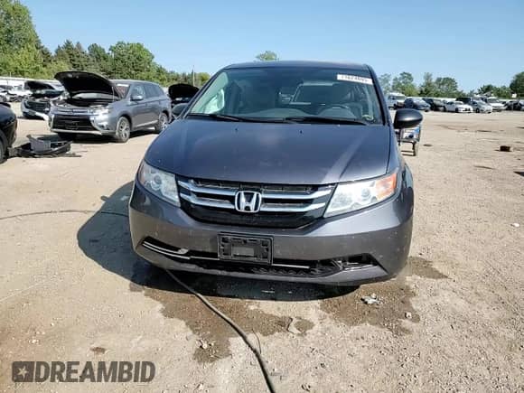 2014 Honda Odyssey LX z VIN 5FNRL5H25EB073844, wystawiony jako Copart lot #71624895 z przebiegiem 169 387 mil mil oraz Szkoda całkowita • Salvage title. Historia ofert i sprzedaży dostępna na DreamBid. Obrazek 14.