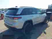 2023 Jeep Grand Cherokee Laredo with VIN 1C4RJHAG5PC659828, listed as a IAAI auction lot 43418211 with 27,942 mi miles and . Bid and sale history available at DreamBid. Image 4.