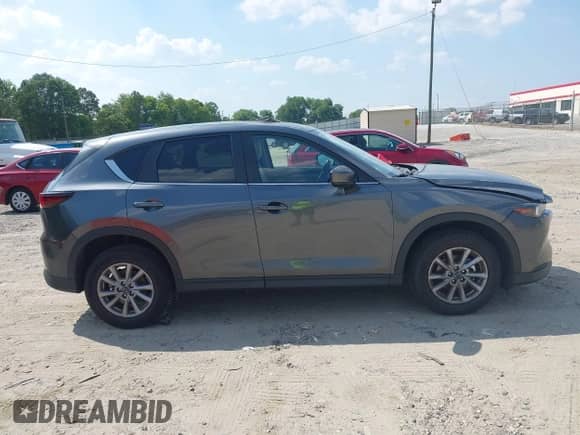 2023 Mazda CX-5 S Preferred z VIN JM3KFBCM3P0183039, wystawiony jako IAAI lot #42671736 z przebiegiem 73 559 mil mil oraz . Historia ofert i sprzedaży dostępna na DreamBid. Obrazek 13.