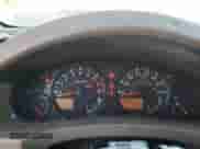 2005 Nissan Frontier SE z VIN 1N6AD06W95C403370, wystawiony jako Copart lot #82293115 z przebiegiem 263 899 mil mil oraz Szkoda całkowita • Salvage title. Historia ofert i sprzedaży dostępna na DreamBid. Obrazek 9.