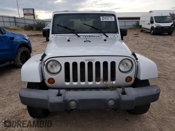 2007 Jeep Wrangler Unlimited Sahara z VIN 1J4GA59167L212909, wystawiony jako Copart lot #82455775 z przebiegiem 124 148 mil mil oraz Czysty tytuł • Clean title. Historia ofert i sprzedaży dostępna na DreamBid. Obrazek 5.