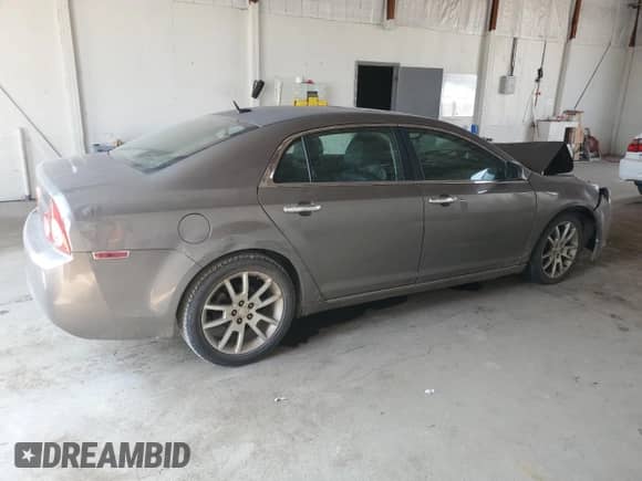 2010 Chevrolet Malibu LTZ with VIN 1G1ZE5EB9A4119121, listed as a Copart auction lot 68419385 with 190,784 mi miles and Salvage title. Bid and sale history available at DreamBid. Image 3.