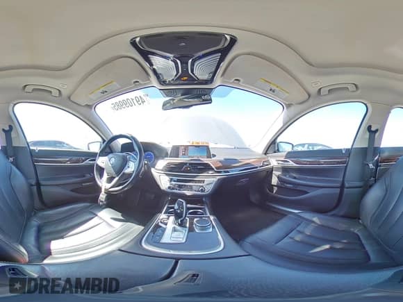 2018 BMW 7 Series 740e xDrive with VIN WBA7J2C55JG938385, listed as a Copart auction lot 49109985 with 81,567 mi miles and Salvage title. Bid and sale history available at DreamBid. Image 13.