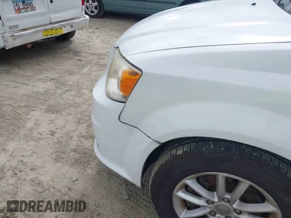 2014 Dodge Grand Caravan SXT with VIN 2C4RDGCG0ER152726, listed as a IAAI auction lot 43232494 with 162,088 mi miles and . Bid and sale history available at DreamBid. Image 6.