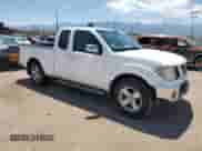 2007 Nissan Frontier SE with VIN 1N6AD06U57C410060, listed as a Copart auction lot 58255225 with 198,277 mi miles and Salvage title. Bid and sale history available at DreamBid. Image 4.