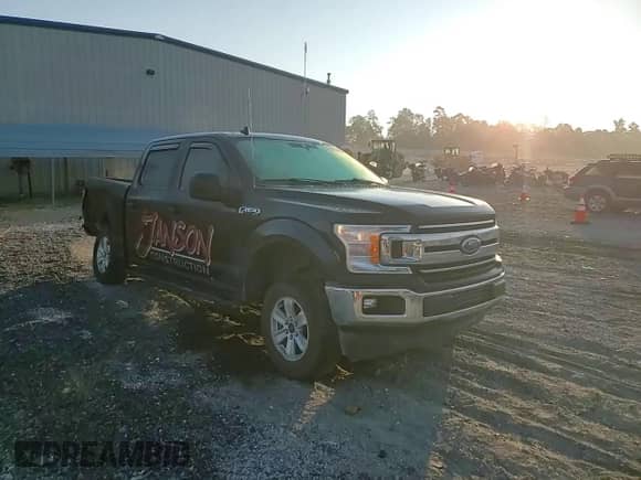 2020 Ford F-150 XL with VIN 1FTEW1C58LFA97533, listed as a Copart auction lot 81291555 with 154,697 mi miles and Salvage title. Bid and sale history available at DreamBid. Image 14.