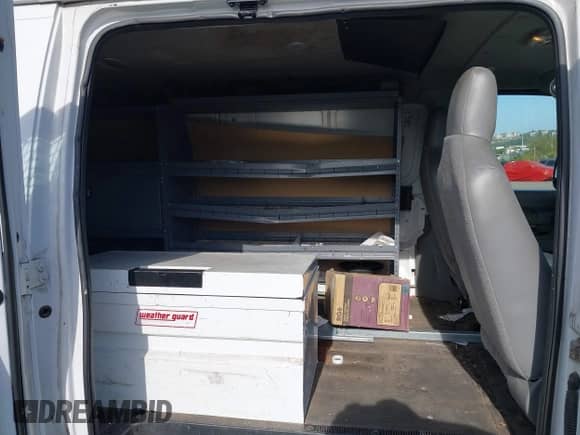 2011 Ford Econoline Cargo Commercial with VIN 1FTNE2EL5BDB28798, listed as a IAAI auction lot 43375192 with 52,410 mi miles and . Bid and sale history available at DreamBid. Image 8.