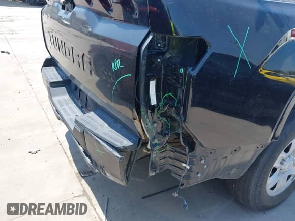 2022 Toyota Tundra SR with VIN 5TFKB5AB7NX017988, listed as a IAAI auction lot 42986871 with 50,437 mi miles and . Bid and sale history available at DreamBid. Image 17.