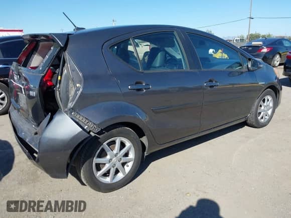 2013 Toyota Prius Three with VIN JTDKDTB32D1037041, listed as a IAAI auction lot 43401357 with 117,651 mi miles and . Bid and sale history available at DreamBid. Image 4.