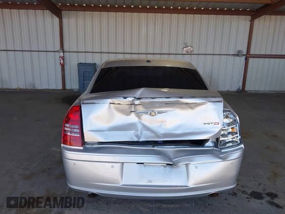 2006 Chrysler 300 C SRT-8 with VIN 2C3LA73W26H471000, listed as a IAAI auction lot 42884335 with 148,180 mi miles and . Bid and sale history available at DreamBid. Image 6.