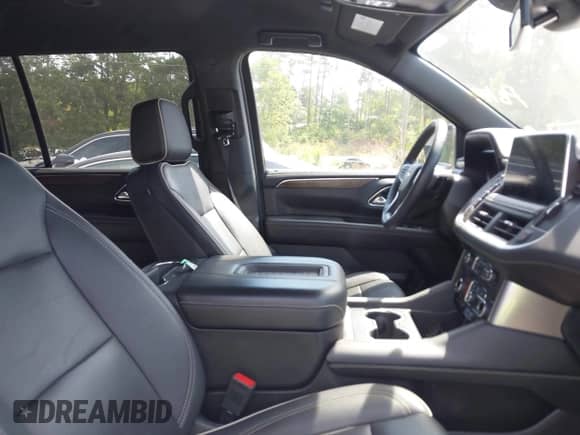 2023 Chevrolet Suburban Premier with VIN 1GNSCFKD9PR547445, listed as a IAAI auction lot 43092390 with 42,878 mi miles and . Bid and sale history available at DreamBid. Image 5.