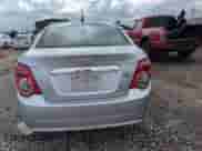 2012 Chevrolet Sonic LT с VIN 1G1JD5SH2C4164834, выставлен на аукционе Copart как лот 53425665 с пробегом 89 043 миль миль и Списание • Salvage title. История ставок и продаж доступна на DreamBid. Изображение 6.