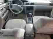 1997 Toyota Camry LE z VIN 4T1BF22K2VU003320, wystawiony jako Copart lot #86212035 z przebiegiem 308 405 mil mil oraz Szkoda całkowita • Salvage title. Historia ofert i sprzedaży dostępna na DreamBid. Obrazek 8.