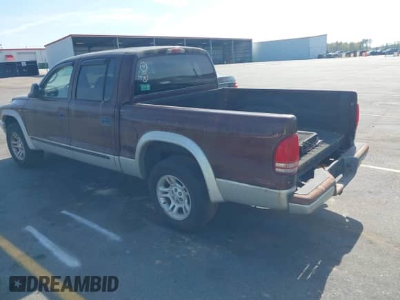 2004 Dodge Dakota SLT z VIN 1D7HL48N74S586018, wystawiony jako IAAI lot #41910755 z przebiegiem 259 924 mil mil oraz . Historia ofert i sprzedaży dostępna na DreamBid. Obrazek 3.