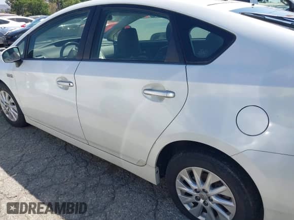 2012 Toyota Prius with VIN JTDKN3DP2C3001950, listed as a IAAI auction lot 42999227 with 298,909 mi miles and . Bid and sale history available at DreamBid. Image 6.