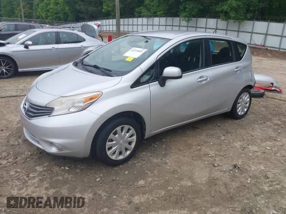 2014 Nissan Note SV with VIN 3N1CE2CP7EL387971, listed as a IAAI auction lot 42235851 with 176,101 mi miles and . Bid and sale history available at DreamBid. Image 2.