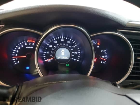 2014 Kia Optima LX с VIN KNAGM4A73E5475543, выставлен на аукционе Copart как лот 72706484 с пробегом 124 533 миль миль и Списание • Salvage title. История ставок и продаж доступна на DreamBid. Изображение 9.