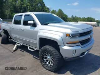 2017 Chevrolet Silverado 1500 LT z VIN 3GCUKREC6HG313466, wystawiony jako IAAI lot #42953764 z przebiegiem 61 329 mil mil oraz . Historia ofert i sprzedaży dostępna na DreamBid. Obrazek 1.