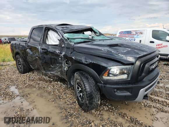 2016 Ram 1500 Rebel z VIN 1C6RR7YT6GS296801, wystawiony jako Copart lot #70754705 z przebiegiem 168 966 mil mil oraz Szkoda całkowita • Salvage title. Historia ofert i sprzedaży dostępna na DreamBid. Obrazek 4.