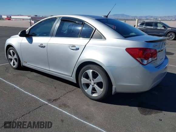 2011 Chevrolet Cruze 1LT z VIN 1G1PF5S96B7254854, wystawiony jako IAAI lot #43487462 z przebiegiem 158 158 mil mil oraz . Historia ofert i sprzedaży dostępna na DreamBid. Obrazek 3.