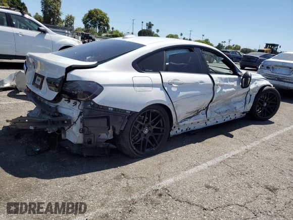 2015 BMW 4 Series 428i z VIN WBA4A5C59FGK15411, wystawiony jako Copart lot #64403615 z przebiegiem 108 660 mil mil oraz Szkoda całkowita • Salvage title. Historia ofert i sprzedaży dostępna na DreamBid. Obrazek 3.