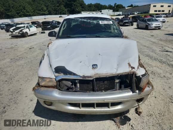 2003 Dodge Dakota SLT z VIN 1D7HG48N53S369358, wystawiony jako Copart lot #80311295 z przebiegiem 215 753 mil mil oraz Szkoda całkowita • Salvage title. Historia ofert i sprzedaży dostępna na DreamBid. Obrazek 5.